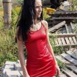 Skinny girl in red spandex dress