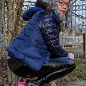 Leather leggings and shiny nylon windbreaker 