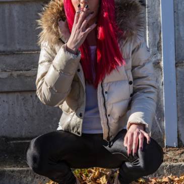 Smoking girl in Moncler Alpine