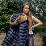 Megan in a blue shiny Moncler down coat