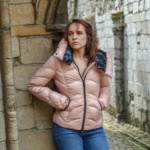 Megan in a pink shiny Moncler down jacket