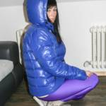 Blue down jacket and purple spandex leggings